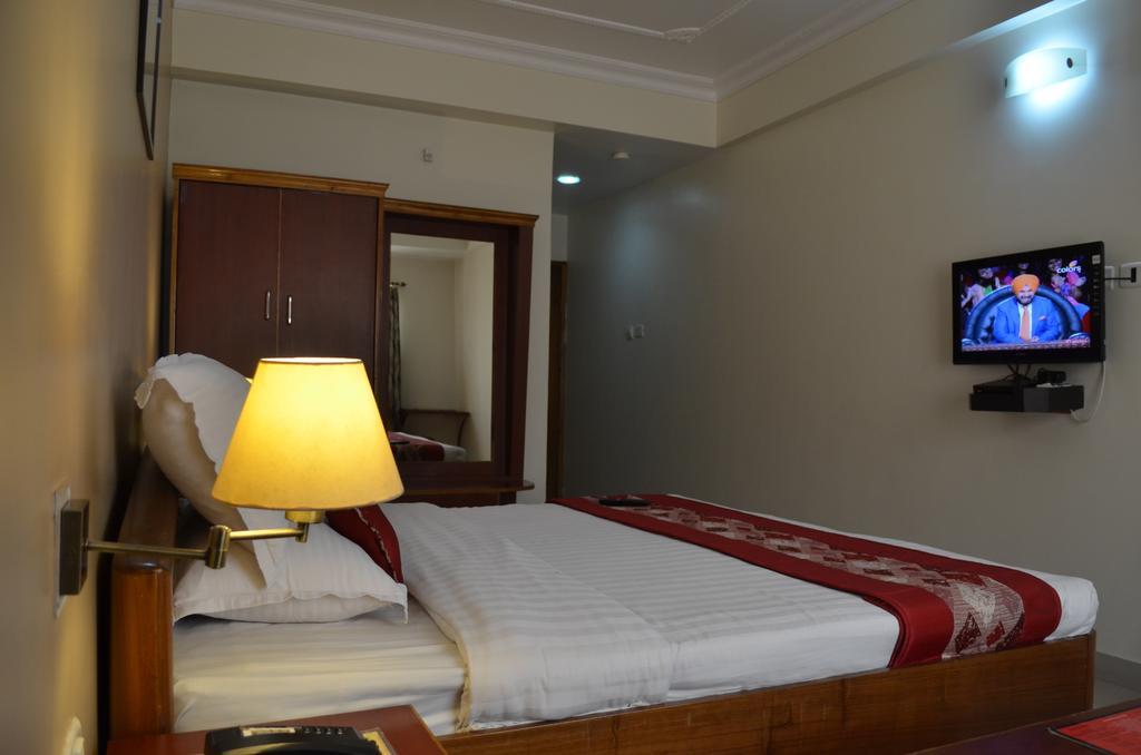 Hotel Rajdhani Regency Guváhátí Pokoj fotografie